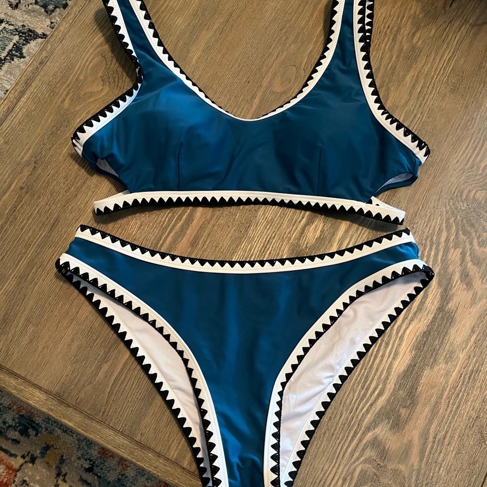 Worn to sunbathe- Cupshe size medium bikini top and bottoms.